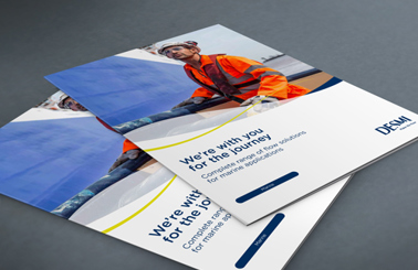 DESMI brochures featuring marine solutions with a worker in safety gear.