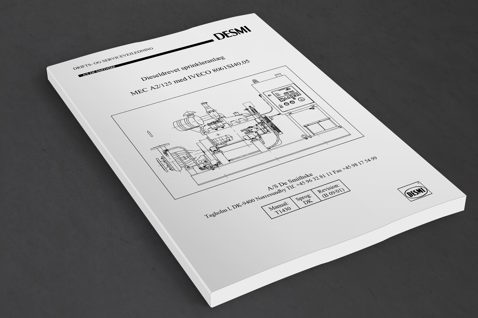 DESMI diesel-driven sprinkler system manual with technical diagram on the cover.