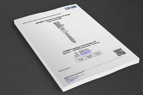 Manual for DESMI Vertical Turbine Pumps, Type DESLUBE, on a dark surface.